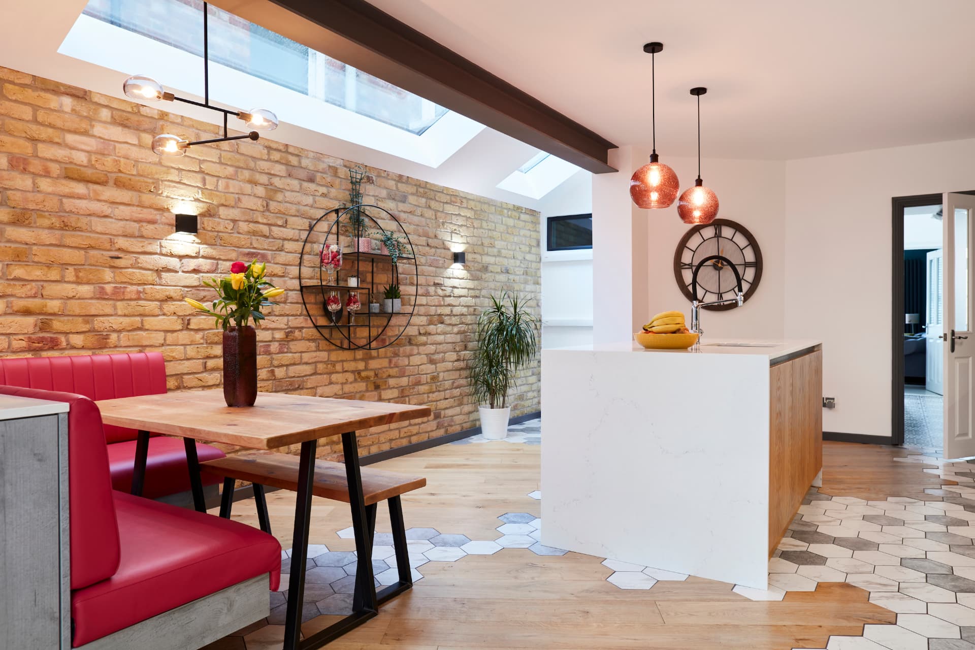 Side return kitchen extension with glazed roof and terracotta floor